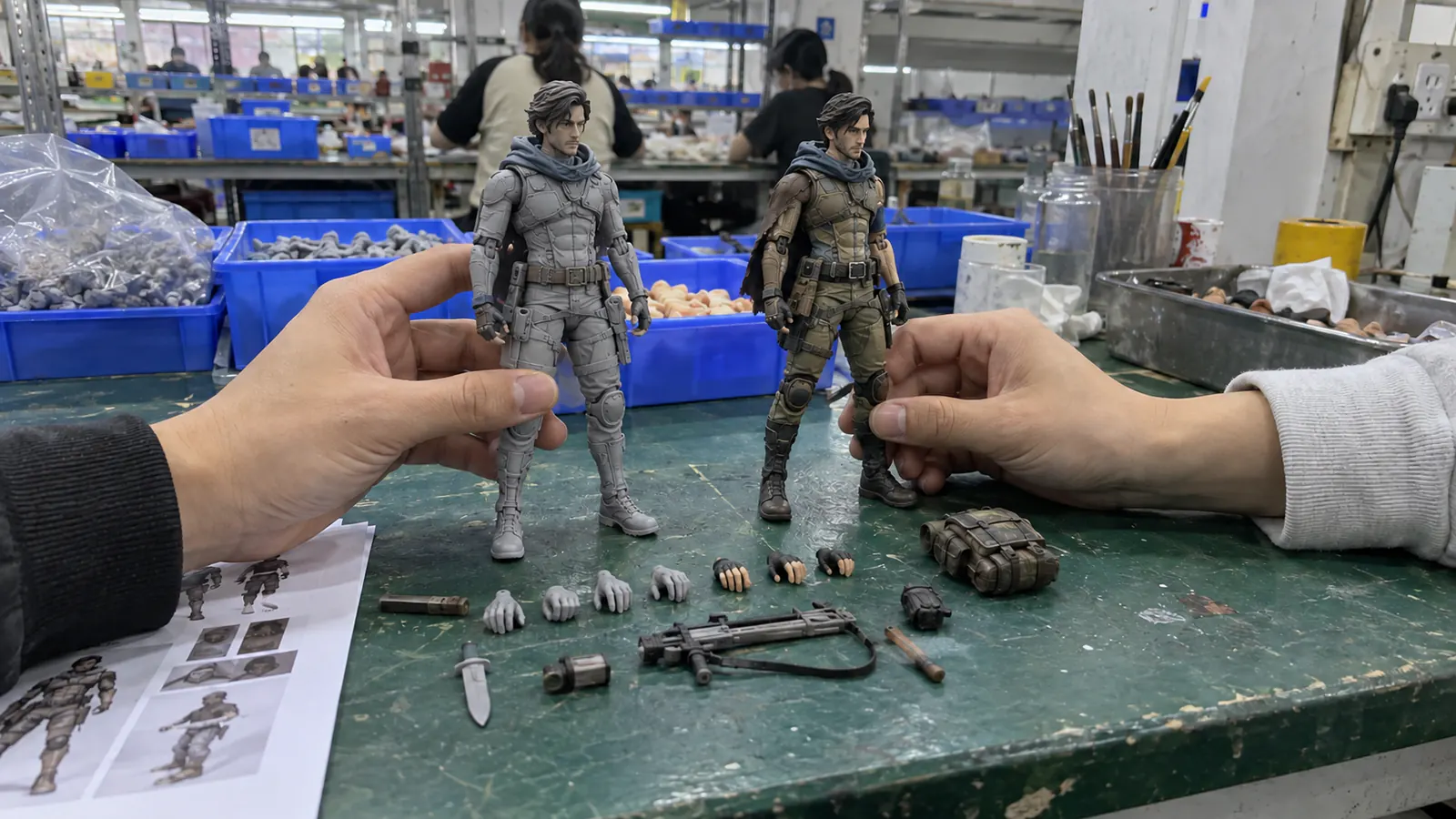 Custom articulated action figure reviewed during manufacturing